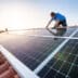 asset-13171421_professional_worker_installing_solar_panels_on_the_roof_of_a_house